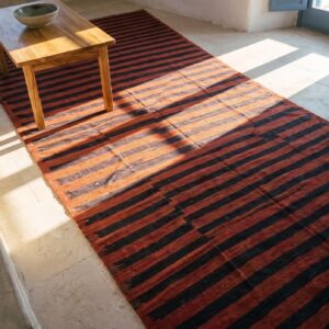 Red Background Blue Striped Antique Oversized Flat Woven Indian Dhurrie Rug (SKU 24148) - styled overhead view