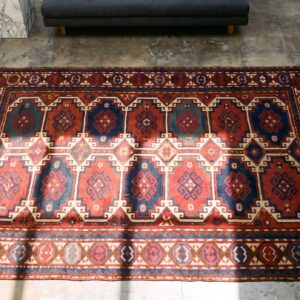 Antique Red Caucasian Moghan Tribal Rug (SKU 21504) - styled overhead view