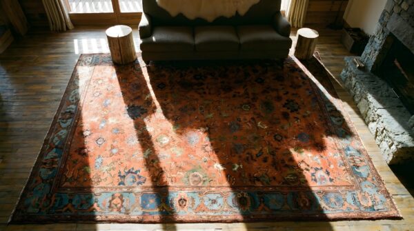 Red large size tribal floral pattern antique persian sultanabad rug 2 Red large size tribal floral pattern antique persian sultanabad rug (sku 24742) - styled overhead view