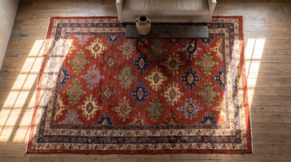 Antique red malayer persian allover geometric knotted rug 2 Antique red malayer persian allover geometric knotted rug (sku 23605) - styled overhead view