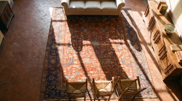 Antique red persian tribal allover design heriz hand knotted wool pile rug 2 Antique red persian tribal allover design heriz hand knotted wool pile rug (sku 24510) - styled overhead view
