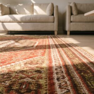 Red Rustic Tribal Geometric Floral Medallion Kufic Border Design Small Antique Persian Senneh Flatweave Rug (SKU 19504) - in-room detail