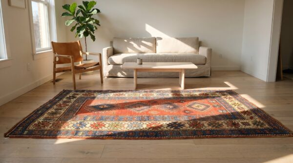 Red rustic antique tribal geometric pattern caucasian kazak rug (sku 17766) - room view