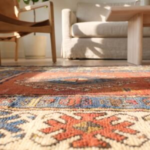 Red Rustic Antique Tribal Geometric Pattern Caucasian Kazak Rug (SKU 17766) - in-room detail