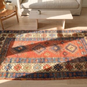 Red Rustic Antique Tribal Geometric Pattern Caucasian Kazak Rug (SKU 17766) - styled overhead view
