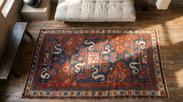 Red antique wool pile tribal caucasian kazak rug 2 Red antique wool pile tribal caucasian kazak rug (sku 22194) - styled overhead view