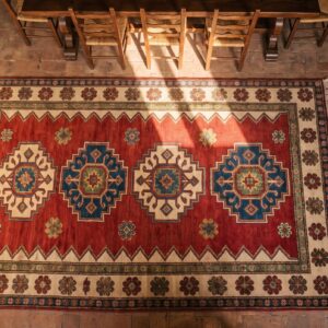 Red Tribal Geometric Antique 19th Century Caucasian Borchalou Kazak Rug (SKU 19262) - styled overhead view