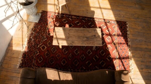 Antique red turkmen turkmenistan geometric knotted rug 9 Antique red turkmen turkmenistan geometric knotted rug (sku 24396) - in-room detail