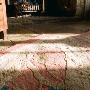 Round 1920s Hand Knotted Pile Wool Coral Antique Rug (SKU 24167) - in-room detail