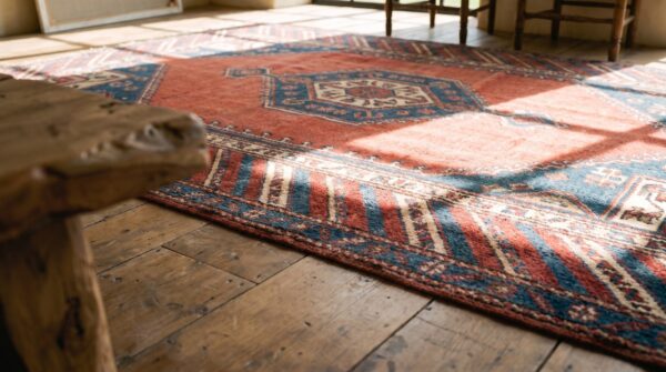 Rustic antique late 19th century geometric caucasian tribal coral rug 9 Rustic antique late 19th century geometric caucasian tribal coral rug (sku 19479) - in-room detail