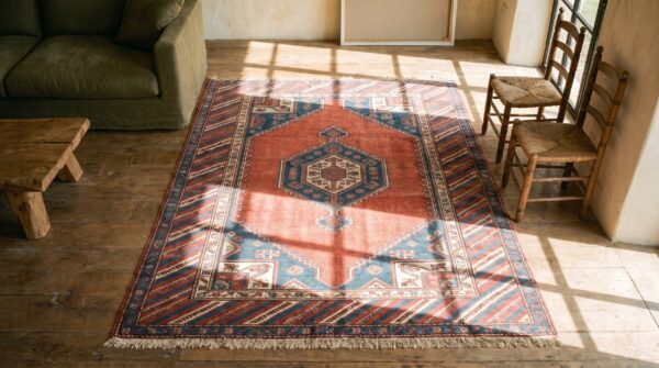 Rustic antique late 19th century geometric caucasian tribal coral rug 2 Rustic antique late 19th century geometric caucasian tribal coral rug (sku 19479) - styled overhead view