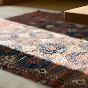 Rustic Oxidized Tribal Design Small Antique Persian Baluch Scatter Rug (SKU 25436) - in-room detail