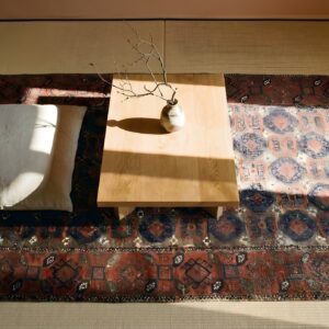 Rustic Oxidized Tribal Design Small Antique Persian Baluch Scatter Rug (SKU 25436) - styled overhead view