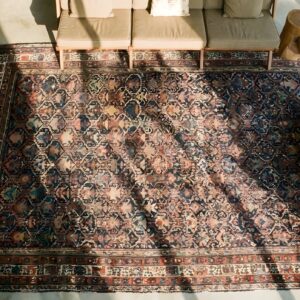 Rustic Tribal Allover Pattern Antique Caucasian Geometric Knotted Rug (SKU 24258) - styled overhead view
