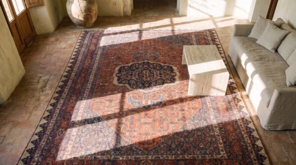 Rustic tribal fish design antique persian coral bidjar room size rug (sku 19674) - styled overhead view