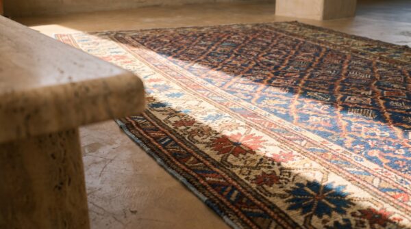 Rustic tribal geometric antique blue caucasian shirvan rug (sku 18174) - in-room detail