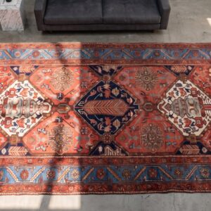 Rustic Tribal Geometric Antique Persian Bakhtiari Wool Pile Coral Area Rug (SKU 21458) - styled overhead view