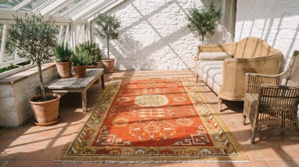 Antique rustic yellow color small size east turkestan wool pile khotan rug 7 Antique rustic yellow color small size east turkestan wool pile khotan rug (sku 20219) - room view