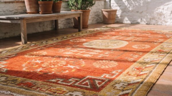 Antique rustic yellow color small size east turkestan wool pile khotan rug 8 Antique rustic yellow color small size east turkestan wool pile khotan rug (sku 20219) - in-room detail