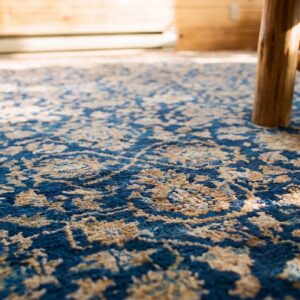 Antique S.E. Persian Kirman Carpet 11'10"×23'10" Navy Floral, Rose Border, Circa 1920 (SKU 20201) - in-room detail