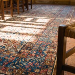 Antique S.E. Persian Kirman Gallery Carpet 5'10"×17'10" Beige Field, Blue Border, Circa 1920 (SKU 20936) - in-room detail
