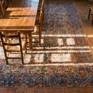 Antique S.E. Persian Kirman Gallery Carpet 5'10"×17'10" Beige Field, Blue Border, Circa 1920 (SKU 20936) - styled overhead view