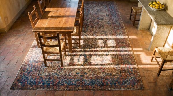 Antique s. E. Persian kirman gallery carpet 5'10"×17'10" beige field, blue border, circa 1920 2 Antique s. E. Persian kirman gallery carpet 5'10"×17'10" beige field, blue border, circa 1920 (sku 20936) - styled overhead view