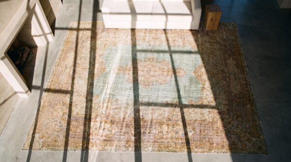 Antique seafoam green open field fine floral medallion large oversized persian kerman rug 2 Antique seafoam green open field fine floral medallion large oversized persian kerman rug (sku 20429) - styled overhead view
