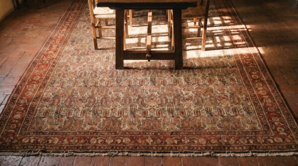 Antique senneh persian ivory 1880s rug (sku 18587) - styled overhead view