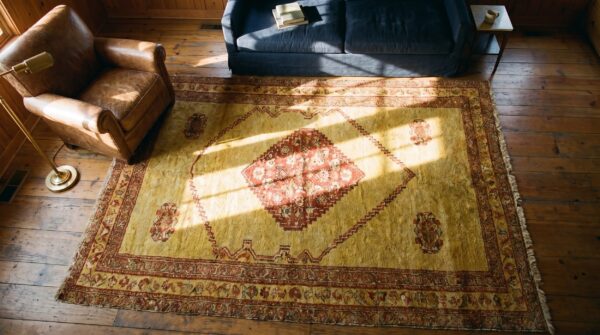 Antique senneh square small scatter size wool yellow rug 2 Antique senneh square small scatter size wool yellow rug (sku 21674) - styled overhead view