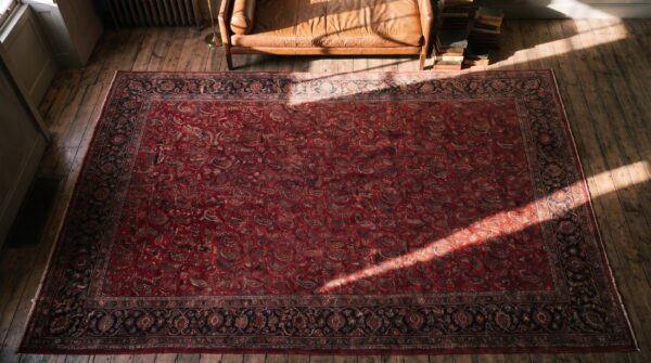 Small allover paisley pattern antique oversized red indian lahore carpet (sku 22528) - styled overhead view