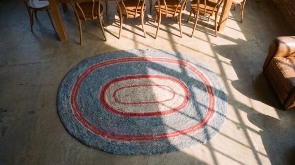 Small antique american minimalist folk art oval hooked rug 2 Small antique american minimalist folk art oval hooked rug (sku 20473) - styled overhead view