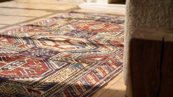 Small colorful antique late 19th century tribal geometric key hole design caucasian shirvan rug 8 Small colorful antique late 19th century tribal geometric key hole design caucasian shirvan rug (sku 19510) - in-room detail