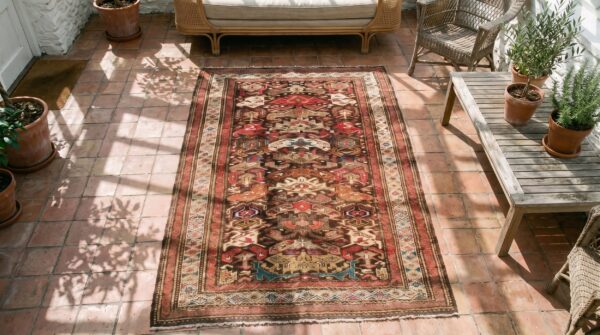 Small coral antique tribal caucasian bidjov hand knotted wool rug 2 Small coral antique tribal caucasian bidjov hand knotted wool rug (sku 18005) - styled overhead view