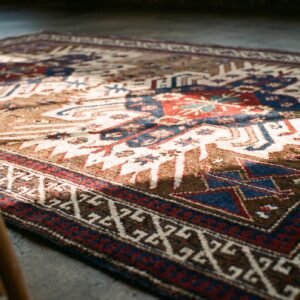 Small Antique Earth Tone Caucasian Tribal Geometric Birds Eagle Kazak Design Seychour Rug (SKU 18244) - in-room detail