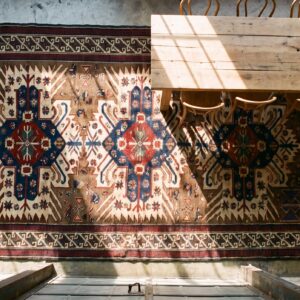 Small Antique Earth Tone Caucasian Tribal Geometric Birds Eagle Kazak Design Seychour Rug (SKU 18244) - styled overhead view