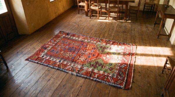 Small red tribal geometric antique turkish yuruk 19th century muslim prayer rug 2 Small red tribal geometric antique turkish yuruk 19th century muslim prayer rug (sku 21208) - styled overhead view