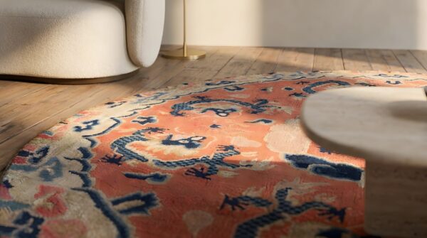 Small round antique coral chinese dragon design ningxia rug 8 Small round antique coral chinese dragon design ningxia rug (sku 22188) - in-room detail