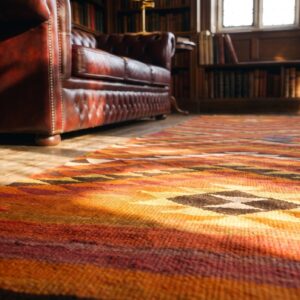 Small Antique Rustic Tribal Native American Geometric Navajo Flat Weave Yellow Rug (SKU 24304) - in-room detail