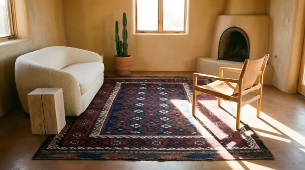 Small scatter size blue background antique tribal geometric persian baluch rug (sku 25435) - room view