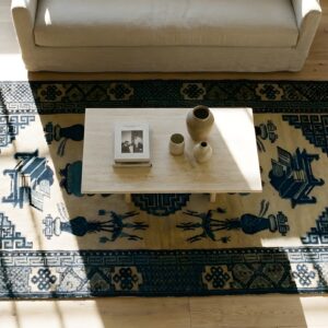 Small Scatter Size Antique Ivory Chinese Geometric Medallion Baotou Rug (SKU 23238) - styled overhead view