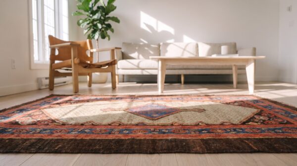 Small scatter size antique tribal geometric persian bakshaish throw rug 4 Small scatter size antique tribal geometric persian bakshaish throw rug (sku 21396) - in-room detail