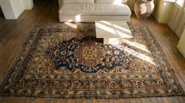 Small size finely woven antique blue background persian tabriz area rug 2 Small size finely woven antique blue background persian tabriz area rug (sku 22121) - styled overhead view