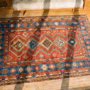 Small Size Red Tribal Geometric Antique Late 19th Century Caucasian Kazak Rug (SKU 18054) - styled overhead view