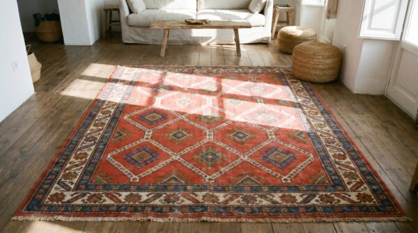 Small square antique tribal geometric design coral persian kurdish rug (sku 19713) - styled overhead view