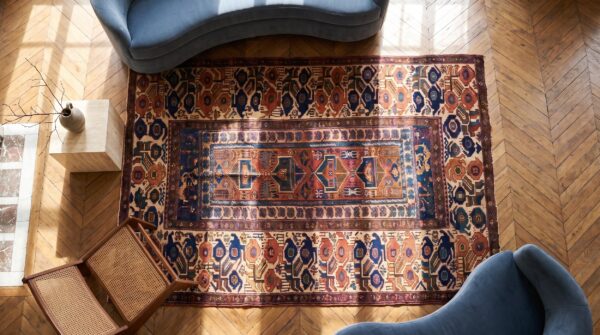 Small tribal antique 19th century persian kurdish sanjabi coral carpet 2 Small tribal antique 19th century persian kurdish sanjabi coral carpet (sku 19435) - styled overhead view