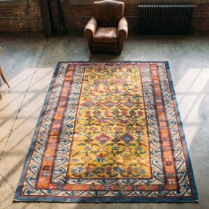 Small Tribal Geometric Antique Yellow Caucasian Seychour Wool Pile Rug (SKU 17900) - styled overhead view