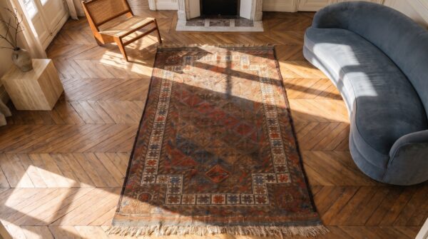 Soft earthy color antique tribal islamic prayer design baluch persian rug 2 Soft earthy color antique tribal islamic prayer design baluch persian rug (sku 21300) - styled overhead view