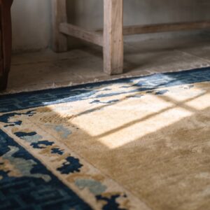Solid Ivory Open Field Antique Small Geometric Peking Chinese Rug (SKU 20911) - in-room detail