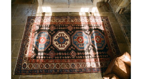 Square allover geometric 1890s blue antique hand knotted pile wool rug 2 Square allover geometric 1890s blue antique hand knotted pile wool rug (sku 21734) - styled overhead view
